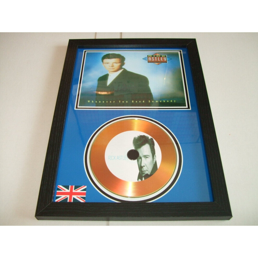 rick astley  signed gold disc