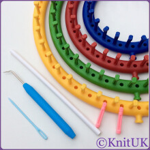 Round Knitting Loom Set of 4. With pink extra-pegs to be fitted.