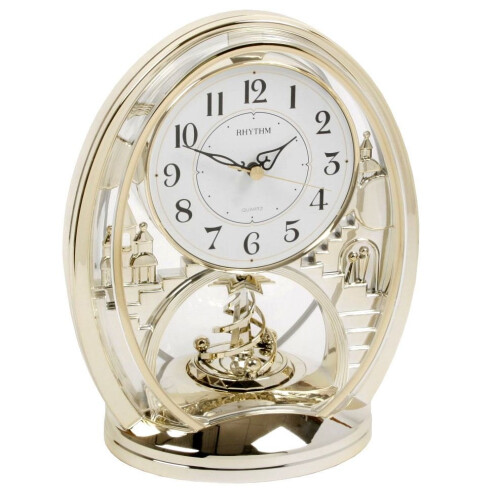 WIDDOP and Co. Rhythm Cont Mantel Clock - Oval Gilt Finish, Arabic Dial, Rotating Pend