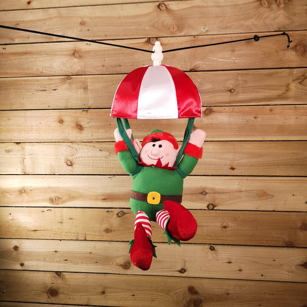Premier Christmas Animated And Musical Kicking Leg Parachuting Elf