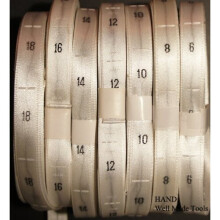 A Roll of Fold Silk Size Label Tabs - White, 500 pcs (14)