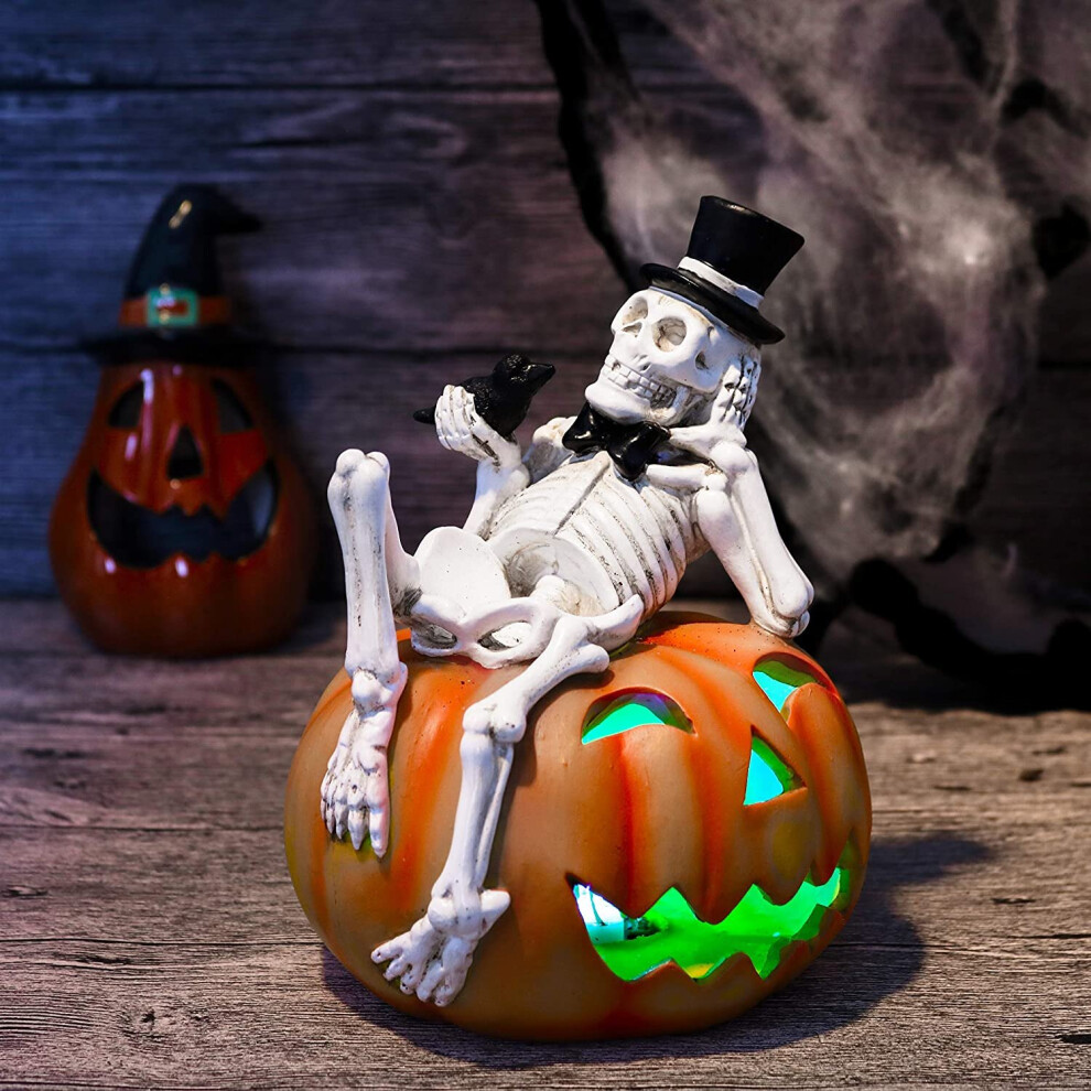 LED Halloween Staute Figurines Halloween Skeleton on Pumpkin Decorations with Color Changing LED Lights for Indoor and Halloween Party Decorations