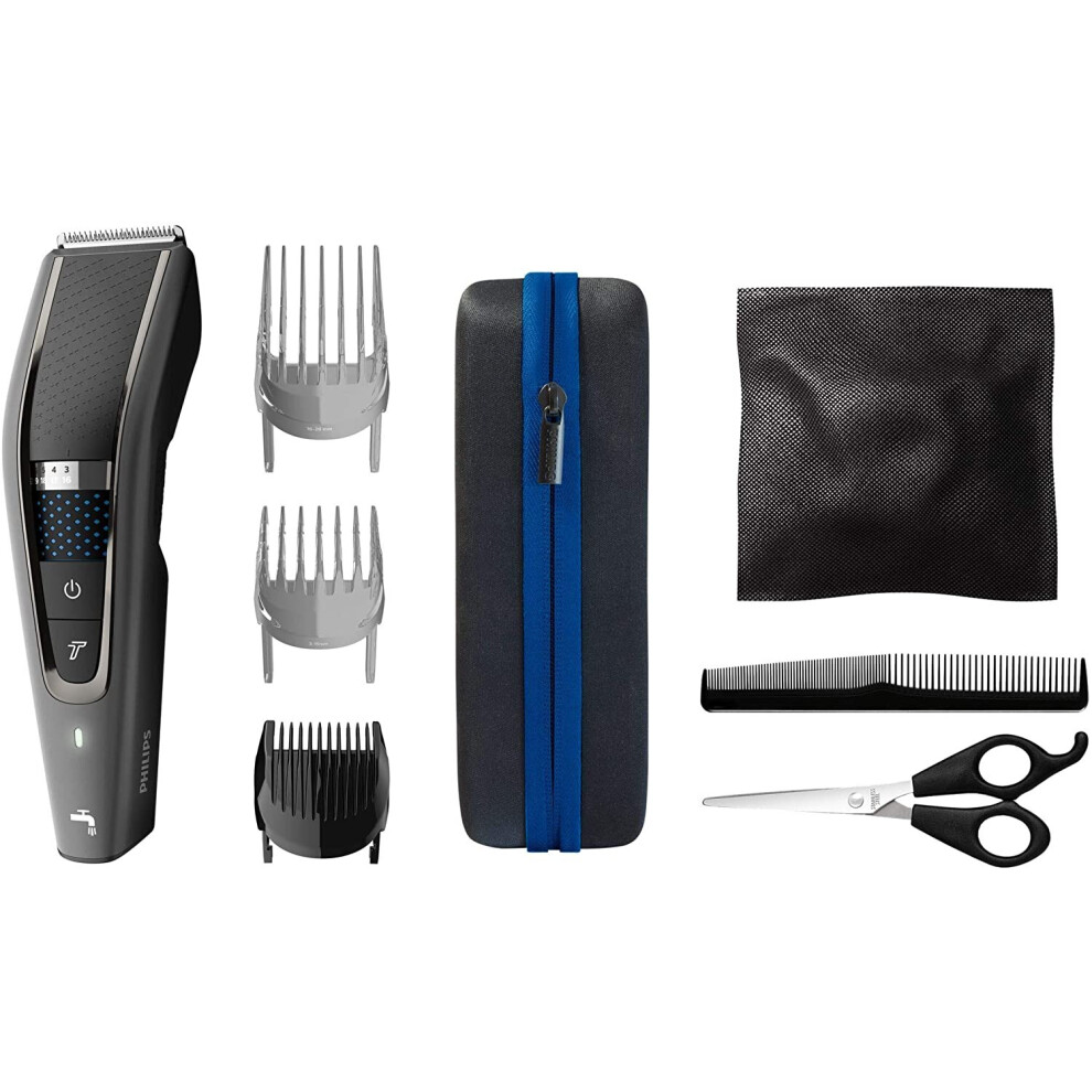 Philips HC7650 / 15 - Hair clipper with titanium blades, 3 combs 28 length settings, 90 min cordless use, includes 3 combs and travel pouch