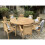 teak round table with 8 stacking chairs 4