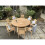 teak round table with 8 stacking chairs 3