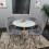 Round White Dining Table And 4 Grey Velvet Tufted Chairs Dining Set 1