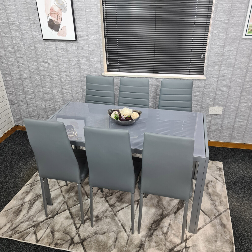 KOSY KOALA ALL GREY GLASS DINING TABLE AND 6 GREY FAUX LEATHER CHAIRS