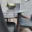Round Grey Glass Kitchen Dining Table With Storage Shelf Chairs Set 7