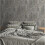 Muriva Plain Charcoal Grey Distressed Stone Concrete Effect Cove Texture Wallpaper 1