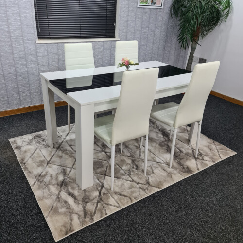 White and black wood dining table with 4 white faux leather chairs