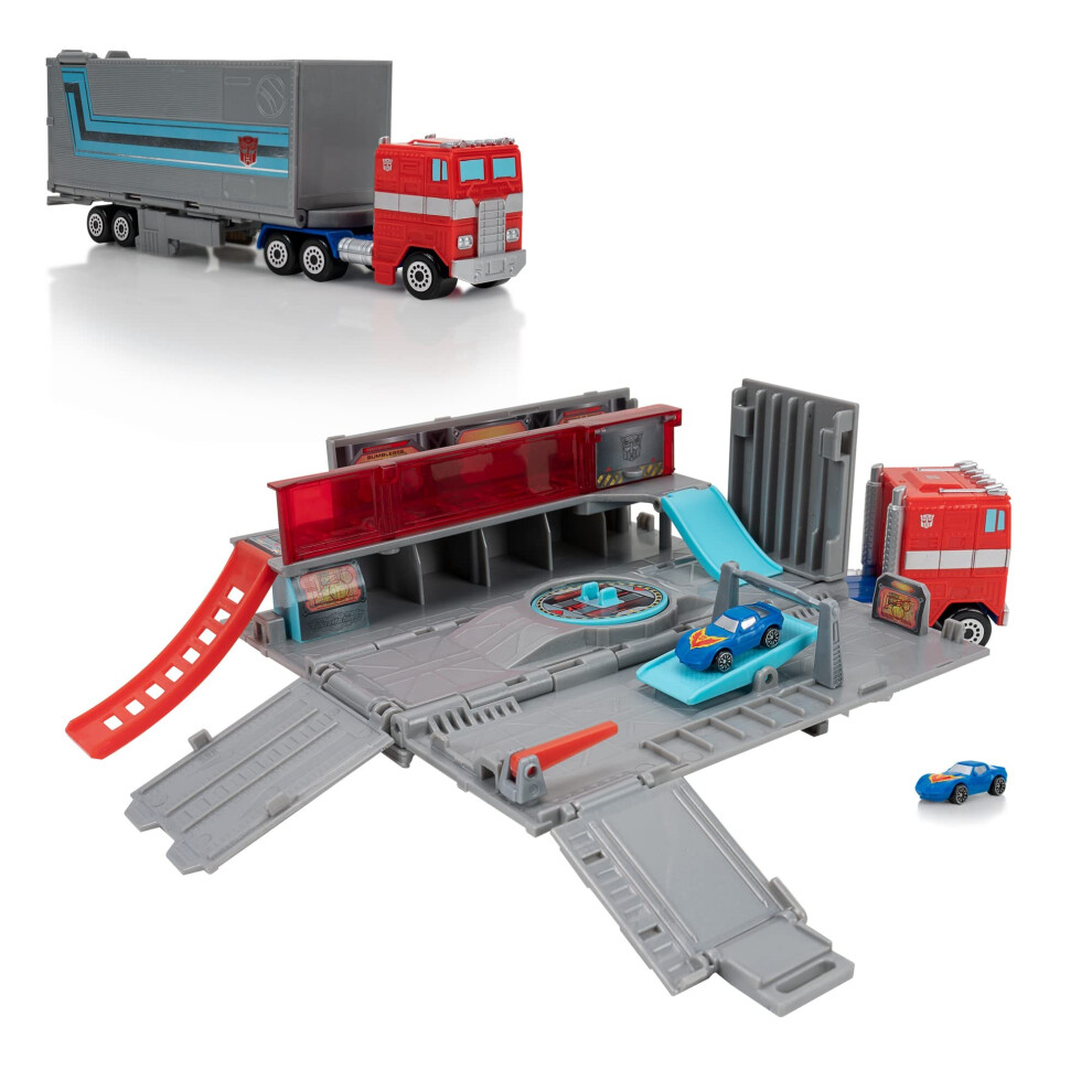 Micro Machines Optimus Prime Hauler PLAYSET - converting Playset with Eight Unique Actions Zones and Exclusive Autobot corvette