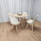 Round Oak Effect Kitchen Dining Table With 4 Cream Tulip Chairs Set 1