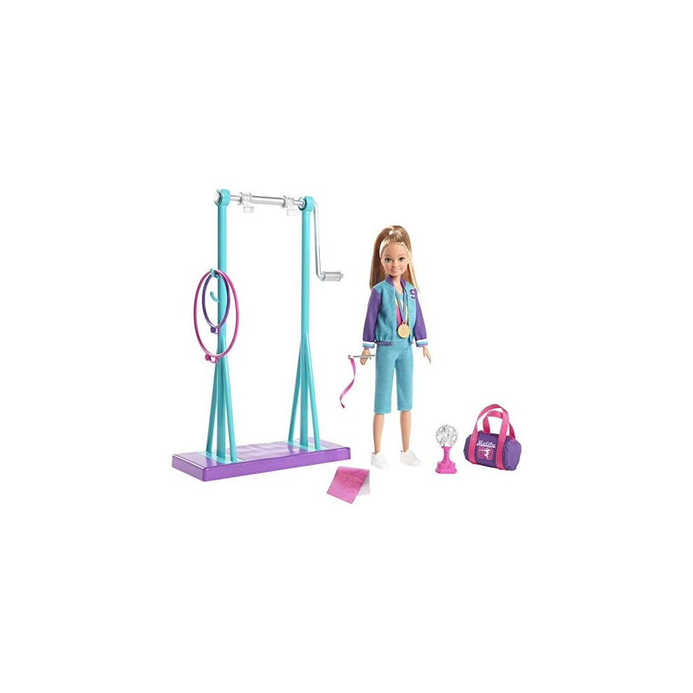 Barbie GBK59 Team Stacie Doll and Gymnastics Playset with Spinning Bar and 7 Themed Accessories, Multicoloured