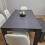 Grey Dining Set with 4 Diamond Stitched White Chairs and 1 Bench 14