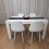Wooden White Black Dining Table with 4 White Stitched Leather Chairs 5