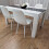 Wooden White Black Dining Table with 4 White Stitched Leather Chairs 4