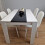 Wooden White Black Dining Table with 4 White Stitched Leather Chairs 2