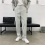 Asymmetric mens suit button decoration loose solid pants male temperament 1