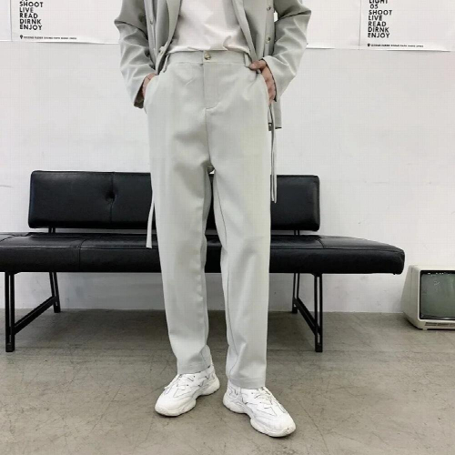 Asymmetric mens suit button decoration loose solid pants male temperament