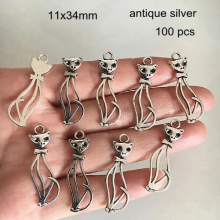 100 pcs - Metal Noble Cat Charms 11x34mm Bronze Tone Antique Silver-color Hollow Cat Pendant,For Crafts Jewelry -E