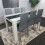 Modern White and Black Wood Dining Table With 6 Grey Metal Chairs 4