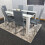 Modern White and Black Wood Dining Table With 6 Grey Metal Chairs 10