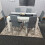 Modern White and Black Wood Dining Table With 6 Grey Metal Chairs 13