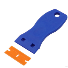 Plastic blade scrapers designed to remove stickers, labels and decals from glass or walls. The plastic scraper tool