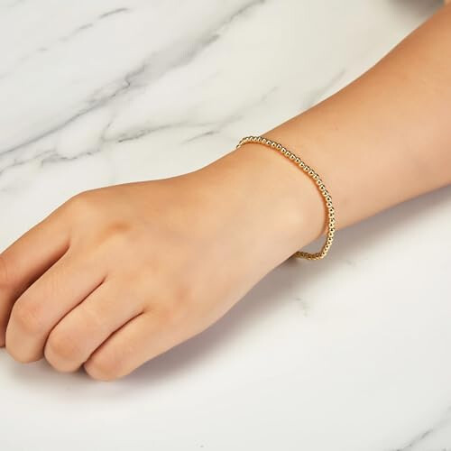 Philip Jones Jewellery Philip Jones Gold Plated Beaded Stretch Bracelet 1