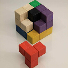 active learning Soma - Cube, 7 Coloured Elements, made Out of RE-Wood In A Biobox
