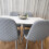 Wooden Dining Table with 4 Grey Gem Patterned Chairs White Table 6