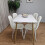 Wooden Dining Table with 4 White Gem Patterned Chairs White Table 3