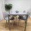 Glass Dining table and 4 grey leather chairs  Grey Glass Table 9