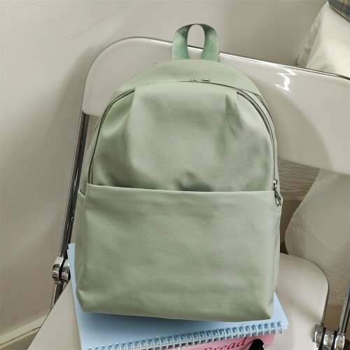 Light green Women s backpack solid color school bag wear resistant multi layer Travel backpack for women medium sized rucksack Trendy letter