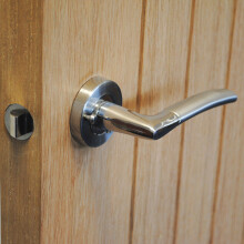 VIBE IOS Push Button Privacy Lever Handle in a Chrome Dual Finish