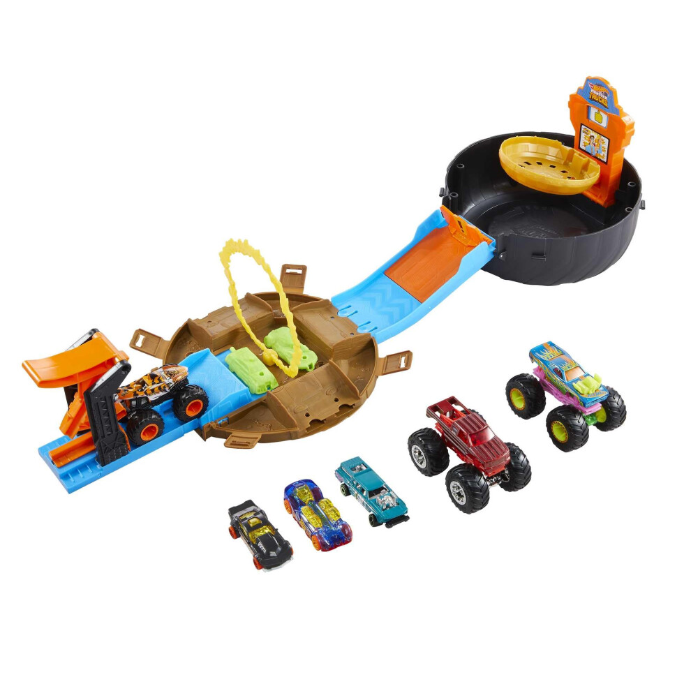 Hot Wheels Monster Trucks Stunt Tire Playset, Includes 3 Monster Trucks & 3 1:64 Scale Vehicles, Gift For Kids 4 To 8 Years Old, Hhy74