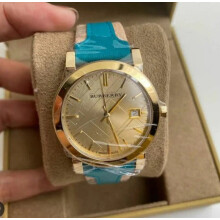 BURBERRY BU9018 UNISEX WATCH TURQUOISE STRAP BEIGE DIAL GOLD CASE