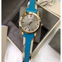 BURBERRY BU9112 WOMEN'S WATCH TURQUOISE STRAP GOLD DIAL GOLD CASE