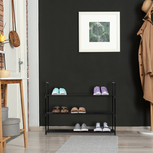 Schwarzes Schuhregal 1