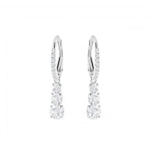 Pendientes colgantes de la triloga Swarovski Stilla Attract con cristales blancos en un engaste chapado en rodio y cierre con bisagras
