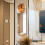 Modern Long Oval Brown Tinted Silver Mirror Decorative Wall  Clock 3