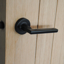 ONYX Naxos Push Button Privacy Lever on Rose Door Handle in Matt Black