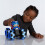 John Deere John Deere Kids TOMY Transformers Optimus Prime Monster Treads Lightning Wheels Toy, Light Up Monster Truck Toy with Neon Wheels, Blue Toys for 5