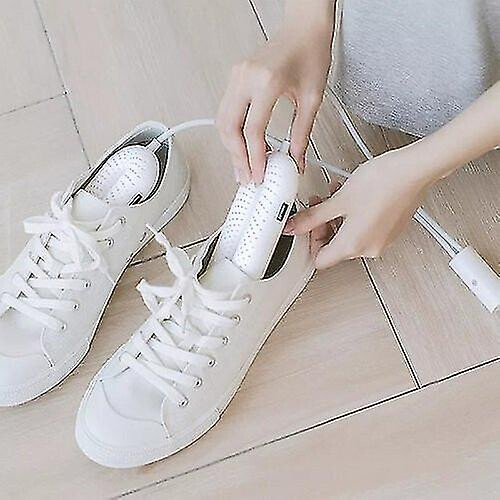 Sèche-chaussures, chauffe-chaussures, élimine les odeurs et désinfecte les chaussures.
