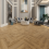 Herringbone Style SPC Click Plank Flooring Underlay Attached - Rustic Mid Oak 1