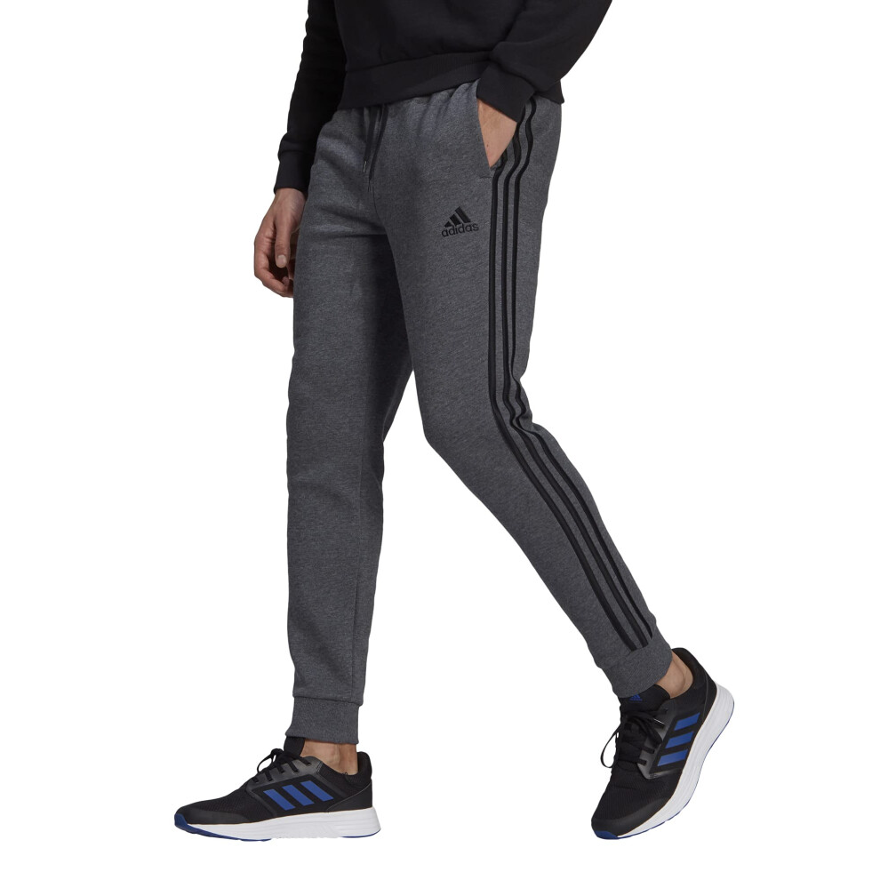 adidas Mens Standard Essentials Fleece Tapered Cuff 3Stripes Pants  Dark Grey HeatherBlack  Small