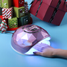 Lampada per unghie colorata purple macchina per terapia con luce UV.