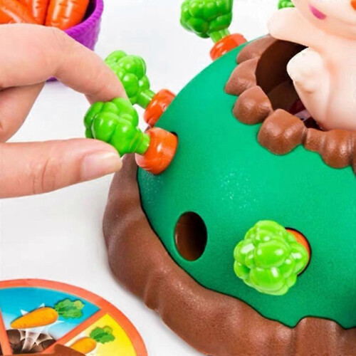 Creative and interesting multiplayer tabletop game the scary electric Tricky Bunny pulling out carrots 1