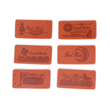 60PCS 2x4cm PU Leather Label Handmade Clothing Embossed Label with Holes Embellishment Knitting DIY Accessories for Jeans Bags Shoes Hat