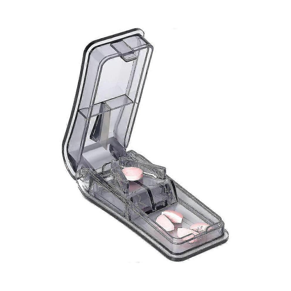 Medicine cutter with blade and storage compartment